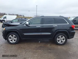 2013 Jeep Grand Cherokee Limited with VIN 1C4RJFBG4DC633137, listed as a IAAI auction lot 41235064 with 163,820 mi miles. Bid and sale history available at carsss.com. Image 15.