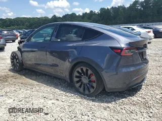 2022 Tesla Model Y Performance with VIN 7SAYGDEF3NF532311, listed as a Copart auction lot 62997535 with 60,530 mi miles and Salvage title. Bid and sale history available at DreamBid. Image 2.