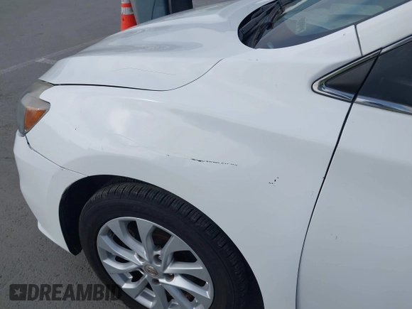 2017 Nissan Sentra SV with VIN 3N1AB7AP6HY314758, listed as a IAAI auction lot 42082152 with 123,718 mi miles and . Bid and sale history available at DreamBid. Image 12.