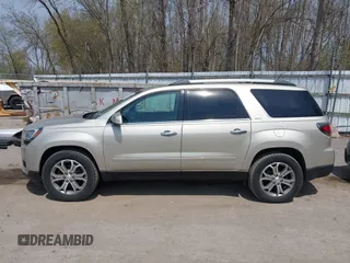 2015 GMC Acadia SLT z VIN 1GKKRSKD2FJ158888, wystawiony jako IAAI lot #42116752 z przebiegiem 156 778 mil mil oraz . Historia ofert i sprzedaży dostępna na DreamBid. Obrazek 14.