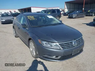 2013 Volkswagen CC Sport with VIN WVWBN7AN0DE551132, listed as a IAAI auction lot 41849514 with 144,557 mi miles. Bid and sale history available at carsss.com. Image 1.