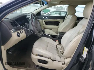 2014 Lincoln MKS EcoBoost z VIN 1LNHL9FT5EG601141, wystawiony jako Copart lot #86497854 z przebiegiem 136 915 mil mil oraz Szkoda całkowita • Salvage title. Historia ofert i sprzedaży dostępna na DreamBid. Obrazek 7.