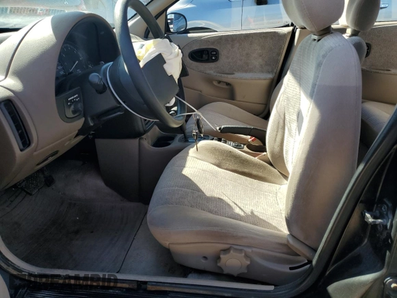 1998 Saturn SL with VIN 1G8ZK5272WZ253120, listed as a Copart auction lot 72911384 with 140,198 mi miles and Salvage title. Bid and sale history available at DreamBid. Image 7.