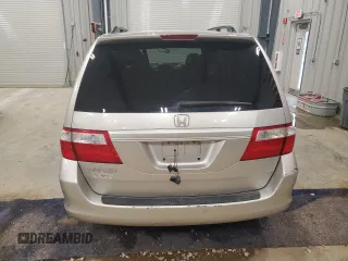 2006 Honda Odyssey EX-L z VIN 5FNRL38606B414740, wystawiony jako Copart lot #51861875 z przebiegiem 86 713 mil mil oraz Czysty tytuł • Clean title. Historia ofert i sprzedaży dostępna na DreamBid. Obrazek 6.