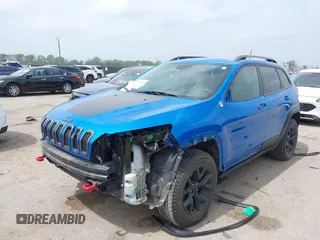 2018 Jeep Cherokee Trailhawk with VIN 1C4PJMBX6JD569684, listed as a IAAI auction lot 41925325 with 149,446 mi miles and . Bid and sale history available at DreamBid. Image 18.