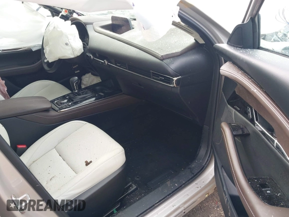 2023 Mazda CX-30 S Premium with VIN 3MVDMBDMXPM563500, listed as a IAAI auction lot 42092423 with 9,148 mi miles and . Bid and sale history available at DreamBid. Image 5.