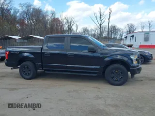 2015 Ford F-150 XLT with VIN 1FTEW1E8XFFB58716, listed as a IAAI auction lot 41854120 with 181,529 mi miles and . Bid and sale history available at DreamBid. Image 13.