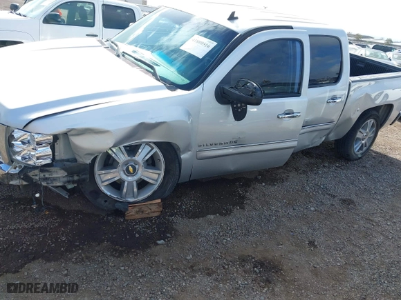 2012 Chevrolet Silverado 1500 LT with VIN 3GCPCSE05CG180389, listed as a IAAI auction lot 41880516 with 113,843 mi miles. Bid and sale history available at carsss.com. Image 6.
