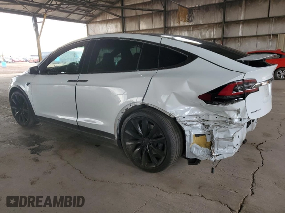 2018 Tesla Model X 75D with VIN 5YJXCBE23JF133589, listed as a Copart auction lot 55573715 with 89,234 mi miles and Salvage Title. Bid and sale history available at DreamBid. Image 2.