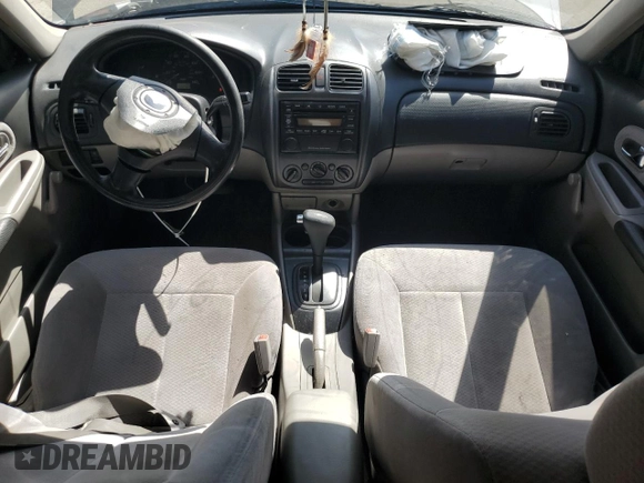 2003 Mazda Protege DX with VIN JM1BJ225730217866, listed as a Copart auction lot 53854075 with 105,782 mi miles and Salvage Title. Bid and sale history available at DreamBid. Image 8.