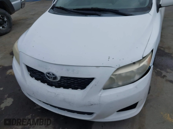 2009 Toyota Corolla with VIN 1NXBU40E99Z082845, listed as a IAAI auction lot 42046564 with 180,910 mi miles. Bid and sale history available at carsss.com. Image 6.