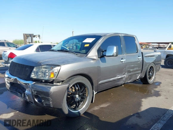 2004 Nissan Titan LE with VIN 1N6AA07A14N541998, listed as a IAAI auction lot 42304039 with 189,533 mi miles and . Bid and sale history available at DreamBid. Image 17.