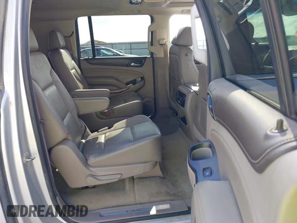 2015 GMC Yukon XL SLT z VIN 1GKS2HKCXFR618783, wystawiony jako IAAI lot #42081053 z przebiegiem 230 368 mil mil oraz . Historia ofert i sprzedaży dostępna na DreamBid. Obrazek 8.