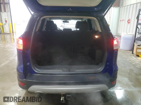 2016 Ford Escape SE with VIN 1FMCU9GX9GUC26772, listed as a Copart auction lot 45337945 with 112,822 mi miles and Salvage Title. Bid and sale history available at DreamBid. Image 6.