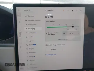 2022 Tesla Model X Plaid z VIN 7SAXCBE69NF352875, wystawiony jako IAAI lot #41964970 z przebiegiem 34 065 mil mil oraz . Historia ofert i sprzedaży dostępna na DreamBid. Obrazek 18.