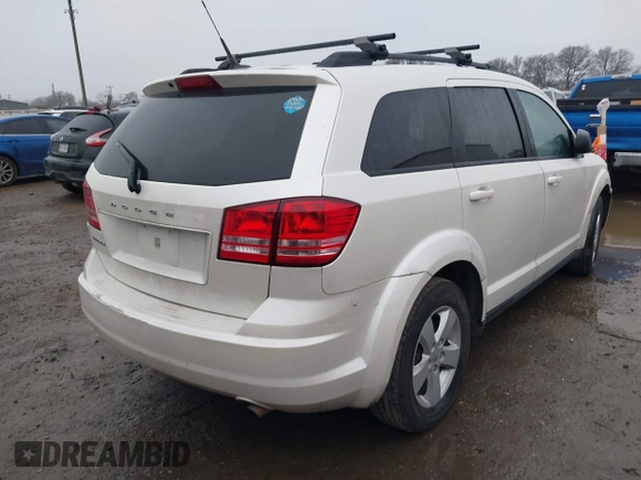 2016 Dodge Journey SE with VIN 3C4PDCAB6GT250263, listed as a IAAI auction lot 41436271 with 162,879 mi miles and . Bid and sale history available at DreamBid. Image 4.