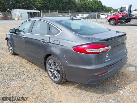2020 Ford Fusion Hybrid Titanium with VIN 3FA6P0RU0LR141494, listed as a IAAI auction lot 39967898 with 88,152 mi miles. Bid and sale history available at carsss.com. Image 3.