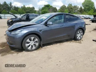 2022 Tesla Model Y Long Range z VIN 7SAYGDEE5NA007772, wystawiony jako Copart lot #56867345 z przebiegiem 17 446 mil mil oraz Szkoda całkowita • Salvage title. Historia ofert i sprzedaży dostępna na DreamBid. Obrazek 1.