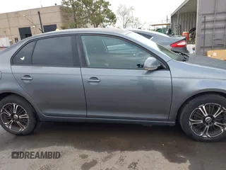 2009 Volkswagen Jetta S with VIN 3VWJZ71K49M053603, listed as a IAAI auction lot 41785816 with 100,065 mi miles and . Bid and sale history available at DreamBid. Image 13.
