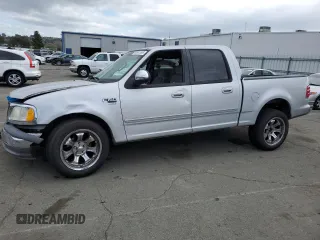 2002 Ford F-150 XLT with VIN 1FTRW07602KE38959, listed as a Copart auction lot 50547095 with 160,908 mi miles and Salvage Title. Bid and sale history available at carsss.com. Image 1.
