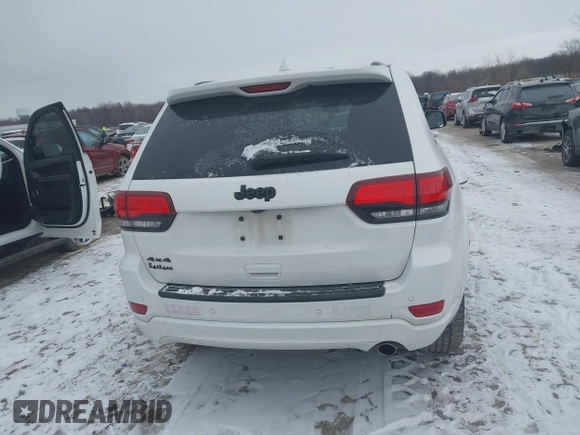 2018 Jeep Grand Cherokee Laredo E with VIN 1C4RJFAG1JC499457, listed as a IAAI auction lot 41379459 with 127,344 mi miles and . Bid and sale history available at DreamBid. Image 17.