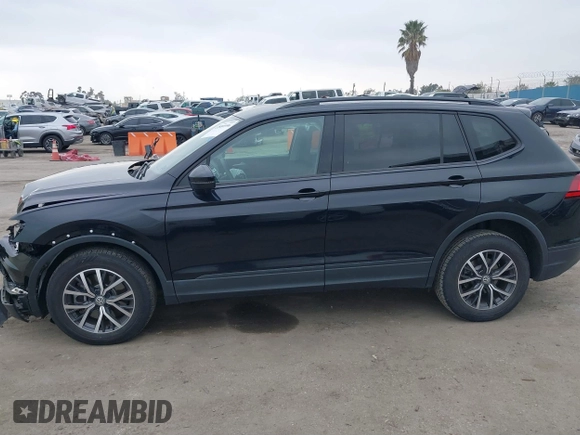 2021 Volkswagen Tiguan S with VIN 3VV1B7AX4MM025586, listed as a IAAI auction lot 41889996 with 21,777 mi miles and . Bid and sale history available at DreamBid. Image 14.