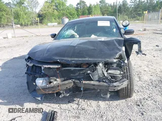 2019 Dodge Charger Police with VIN 2C3CDXAT0KH688698, listed as a IAAI auction lot 42090480 with 49,151 mi miles and . Bid and sale history available at DreamBid. Image 6.