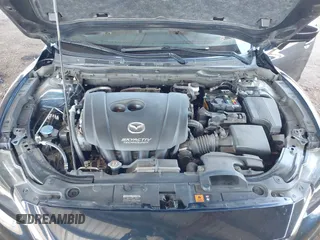 2016 Mazda 6 i Touring with VIN JM1GJ1T5XG1434388, listed as a IAAI auction lot 41528124 with 99,293 mi miles and . Bid and sale history available at DreamBid. Image 10.