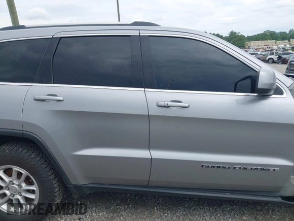 2018 Jeep Grand Cherokee Laredo E with VIN 1C4RJFAG4JC475993, listed as a IAAI auction lot 42295008 with 106,024 mi miles and . Bid and sale history available at DreamBid. Image 14.