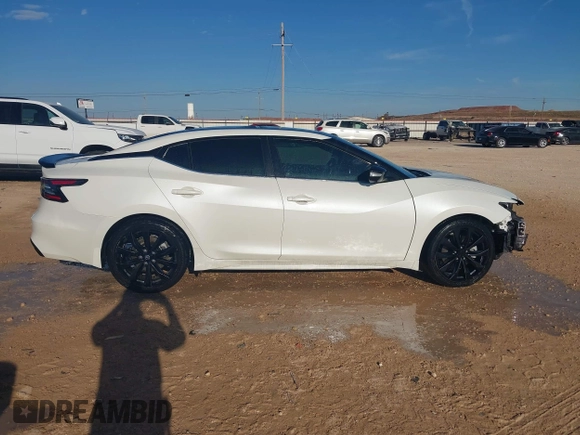 2020 Nissan Maxima SR with VIN 1N4AA6EVXLC365710, listed as a IAAI auction lot 40969464 with 74,320 mi miles and . Bid and sale history available at DreamBid. Image 13.
