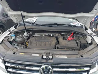 2019 Volkswagen Tiguan S with VIN 3VV1B7AX2KM039970, listed as a IAAI auction lot 41498706 with 56,907 mi miles and . Bid and sale history available at DreamBid. Image 10.