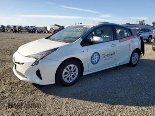 2016 Toyota Prius Two z VIN JTDKBRFU5G3001087, wystawiony jako Copart lot #87929015 z przebiegiem 144 702 mil mil oraz Szkoda całkowita • Salvage title. Historia ofert i sprzedaży dostępna na DreamBid. Obrazek 1.
