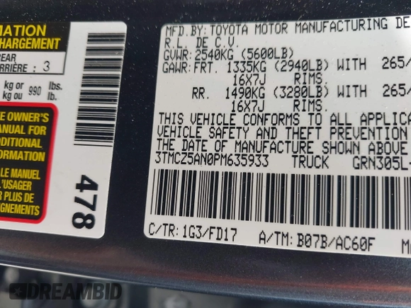 2023 Toyota Tacoma SR with VIN 3TMCZ5AN0PM635933, listed as a IAAI auction lot 42543126 with 32,960 mi miles and . Bid and sale history available at DreamBid. Image 9.