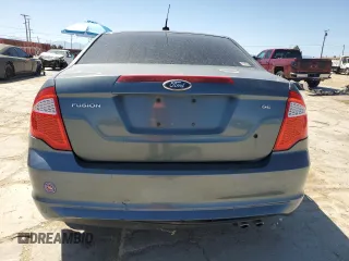 2012 Ford Fusion SE z VIN 3FAHP0HA0CR213729, wystawiony jako Copart lot #52458665 z przebiegiem 107 419 mil mil oraz Czysty tytuł • Clean title. Historia ofert i sprzedaży dostępna na DreamBid. Obrazek 6.