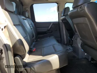 2005 Nissan Titan LE with VIN 1N6BA07B95N571880, listed as a Copart auction lot 57527435 with 199,577 mi miles and Salvage title. Bid and sale history available at DreamBid. Image 10.