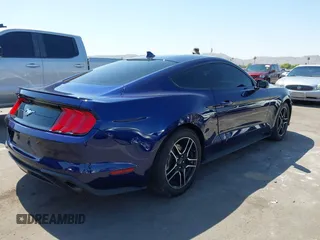 2020 Ford Mustang EcoBoost z VIN 1FA6P8TH7L5182508, wystawiony jako IAAI lot #42621368 z przebiegiem 75 597 mil mil oraz . Historia ofert i sprzedaży dostępna na DreamBid. Obrazek 4.