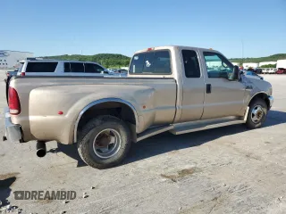 1999 Ford F-350 with VIN 1FTWX32F6XED54952, listed as a Copart auction lot 57676805 with 146,544 mi miles and Salvage title. Bid and sale history available at DreamBid. Image 3.