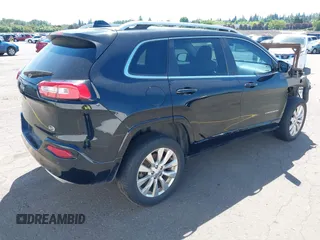 2017 Jeep Cherokee Overland z VIN 1C4PJMJS1HW530604, wystawiony jako IAAI lot #41701168 z przebiegiem 112 945 mil mil oraz . Historia ofert i sprzedaży dostępna na DreamBid. Obrazek 4.
