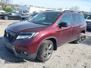 2021 Honda Passport Touring z VIN 5FNYF8H91MB022986, wystawiony jako IAAI lot #42077321 z przebiegiem 20 497 mil mil oraz . Historia ofert i sprzedaży dostępna na DreamBid. Obrazek 2.