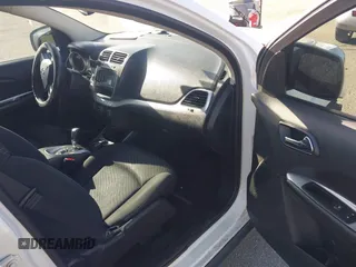 2015 Dodge Journey SE z VIN 3C4PDCAB4FT600293, wystawiony jako IAAI lot #41981386 z przebiegiem 143 573 mil mil oraz . Historia ofert i sprzedaży dostępna na DreamBid. Obrazek 5.