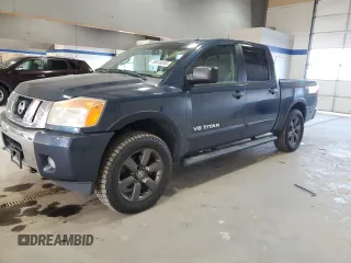 2015 Nissan Titan Pro-4X with VIN 1N6BA0EC4FN506948, listed as a Copart auction lot 86536044 with 179,674 mi miles and Salvage title. Bid and sale history available at DreamBid. Image 1.
