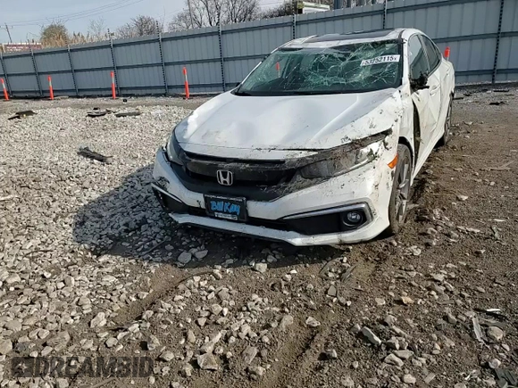2019 Honda Civic EX-L z VIN 19XFC1F76KE005063, wystawiony jako Copart lot #53252115 z przebiegiem 87 758 mil mil oraz Szkoda całkowita • Salvage title. Historia ofert i sprzedaży dostępna na DreamBid. Obrazek 11.
