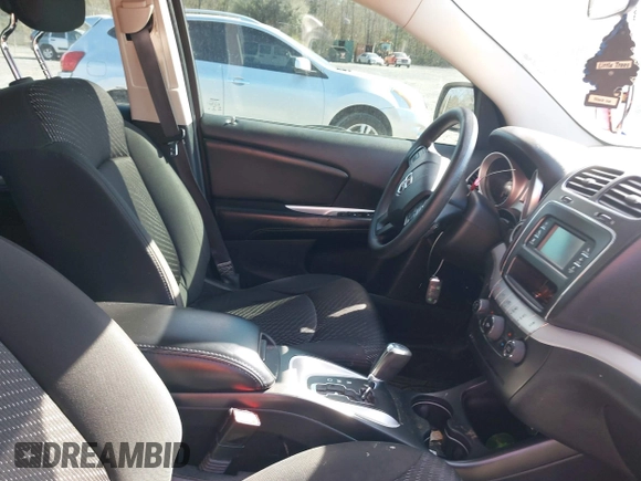 2014 Dodge Journey SE with VIN 3C4PDCABXET277723, listed as a IAAI auction lot 41709752 with 161,587 mi miles and . Bid and sale history available at DreamBid. Image 5.