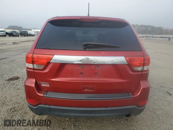 2011 Jeep Grand Cherokee Laredo with VIN 1J4RS4GG6BC704212, listed as a Copart auction lot 83753234 with 200,104 mi miles and Salvage Title. Bid and sale history available at DreamBid. Image 6.