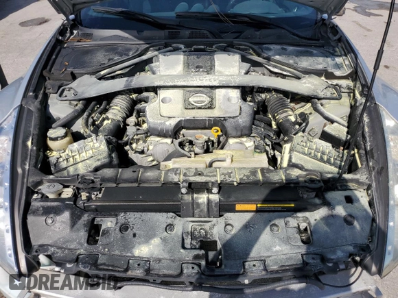 2010 Nissan 370Z Touring with VIN JN1AZ4EH2AM506507, listed as a Copart auction lot 70469504 with 115,594 mi miles and Salvage Title. Bid and sale history available at carsss.com. Image 11.