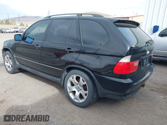 2001 BMW X5 4.4i with VIN WBAFB33531LH22723, listed as a IAAI auction lot 41834755 with 184,082 mi miles. Bid and sale history available at carsss.com. Image 3.