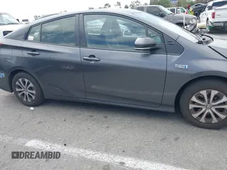 2021 Toyota Prius LE with VIN JTDKAMFP0M3193305, listed as a IAAI auction lot 42283494 with 322,523 mi miles and . Bid and sale history available at DreamBid. Image 13.