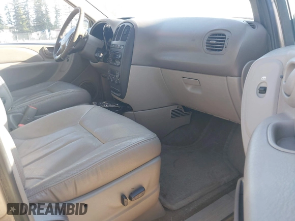 2002 Dodge Grand Caravan with VIN 2B8GT54L82R541812, listed as a IAAI auction lot 42028066 with 207,472 mi miles and . Bid and sale history available at DreamBid. Image 5.