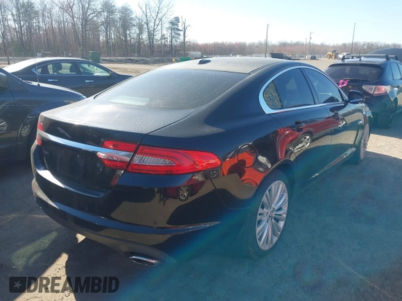 2012 Jaguar XF Portfolio with VIN SAJWA0HB5CLS40694, listed as a IAAI auction lot 41820189 with 1 mi miles. Bid and sale history available at carsss.com. Image 4.