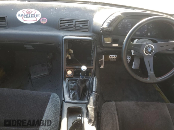 1989 Nissan Skyline z VIN HCR32034297, wystawiony jako Copart lot #79498714 z przebiegiem 125 635 mil mil oraz Czysty tytuł • Clean title. Historia ofert i sprzedaży dostępna na DreamBid. Obrazek 8.